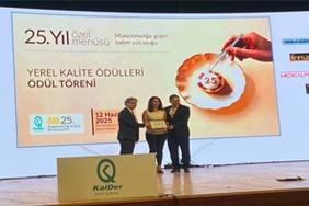 izmir-buyuksehir-mukemmelligi-arayis-sempozyumundan-odulle-ayrildi.jpg